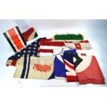 A USA flag and other flags and pennants