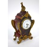A 19th/20th century gilt metal mounted tortoiseshell mantel clock