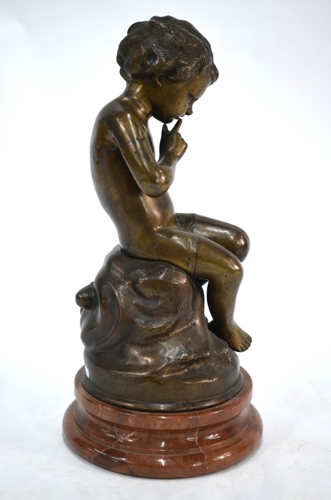 A bronze figure of a contemplative young cherub - Image 2 of 3