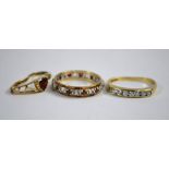 Three old gold stone set rings