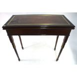 A George III brass and ebony banded mahogany card table