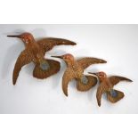 A trio of Beswick graduated humming bird wall plaques