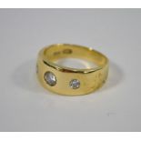 A diamond set gypsy ring