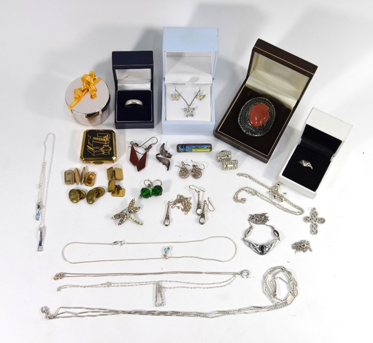 A small collection of various white metal jewellery