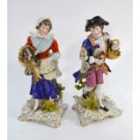 A pair of Naples porcelain figures