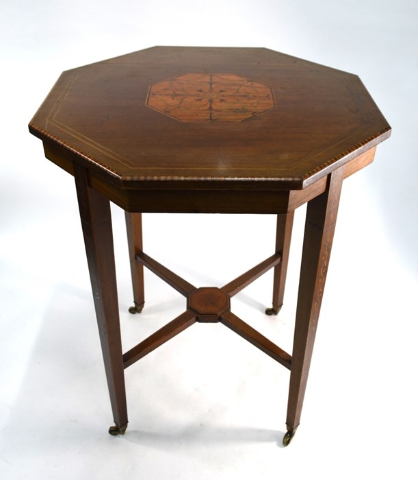 An Edwardian inlaid satin walnut octagonal table