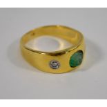 A yellow metal gypsy set ring
