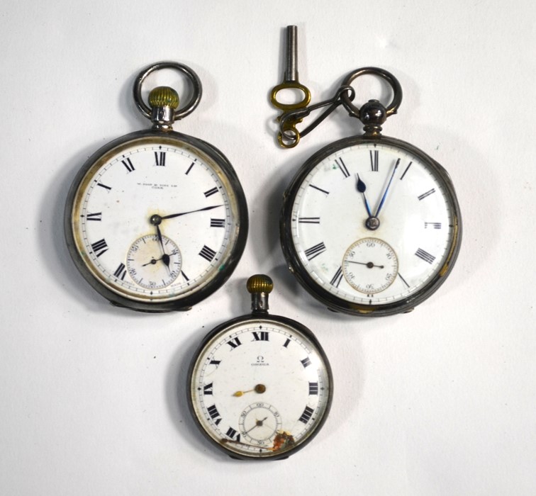 An Omega silver fob watch and two pocket watches