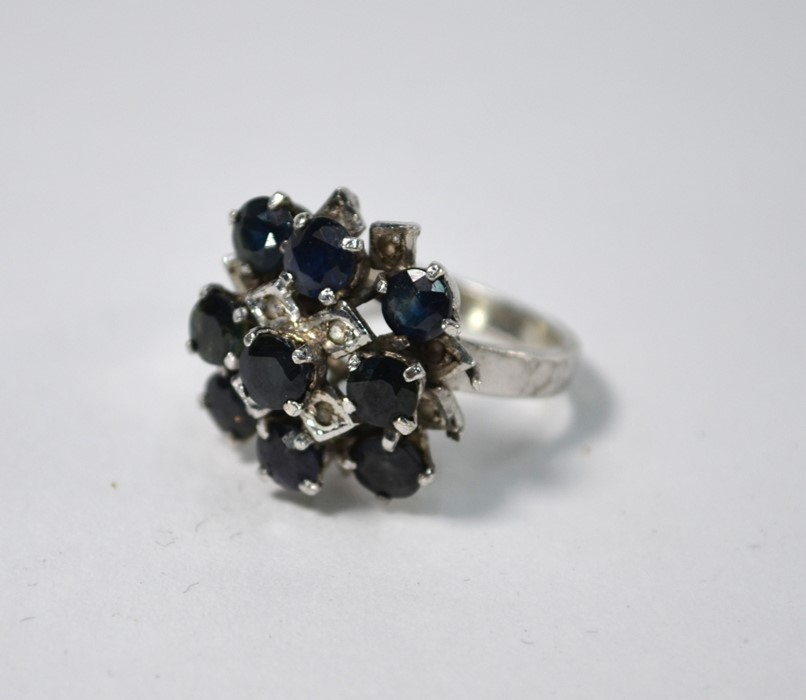 A cluster cocktail ring