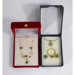 A yellow metal earring, ring and pendant suite