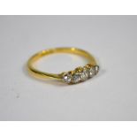 A five stone graduated diamond ring
