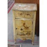 An antique painted pine bow front side cabinet with single drawer over cupboard door with