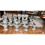 Suite of drinking glasses with bell shaped bowls and ten tall tumblers