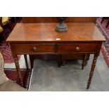 An Edwardian mahogany hall table with two drawers