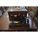 A Victorian American Wheeler & Wilson no 8 sewing machine in wooden case