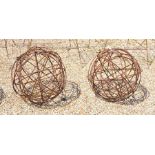 A pair of medium armillary garden-art features with spherical weathered metal framework (2)