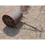 An old wrought and cast iron garden roller