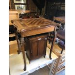 An antique chequerboard inlaid table to/with a small oak cabinet (2)