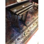 A nest of three mahogany occasional tables a/f to/with a Chinese style glass top coffee table (2)