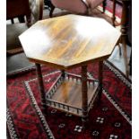 Edwardian inlaid rosewood octagonal table on turned supports united by a galleried under-tier to/w a