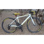A children's Carrera TDF JR Ltd road bike with white and yellow frame [p18062619]