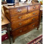 A Georgian mahogany chest of two short over three long drawers with later brass handles, raised on