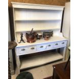 An antique Anglo-Flemish carved oak dresser, later painted