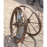 Two antique cast iron eight spoke-wheels (2)