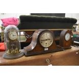 An anniversary clock, an oak cased triple train mantle clock and an inlaid oak cased Gothic style