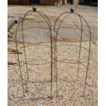 A pair of dumpy ball head obelisks