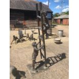 A patinated bronze and copper sculpture - two boys with a ladder, scrumping, 230 cm h