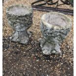A pair of weathered stone garden planters (2)