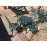 A Victorian style cast alloy green painted terrace set, comprising a table and four chairs (5)