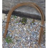 A set of ten small steel garden hoops