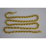 A yellow metal rope chain