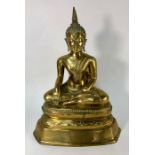 A Thai brass statue of Buddha