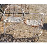 A Victorian style painted metal garden conversation seat