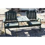 A green painted slatted teak garden 'conversation' seat