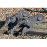 A pair of cast composite bronzed garden greyhound sculptures