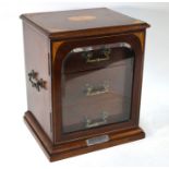 A Sheraton Revival influenced inlaid rosewood smokers cabinet