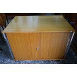 A vintage teak cabinet