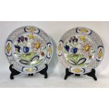 A pair of 18th century English Delft polychrome chargers