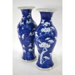 A pair of Chinese blue and white porcelain prunus vases on cracked ice ground