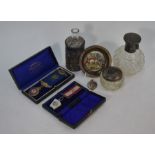 Cut glass scent bottle with silver top and other silver mounted items