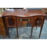 A George III inlaid mahogany serpentine front sideboard