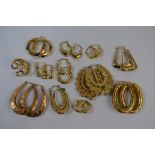 A collection of various yellow metal and 9ct yellow gold Creole and hoop earrings