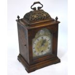 A Georgian style walnut cased mantle clock with 8-day Smiths movement
