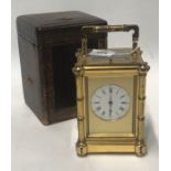 A Victorian brass cased carriage clock by Henri Jacot, the two train movement No.9527