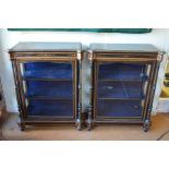 A pair of Victorian ebonised, amboyna and ormolu mounted pier cabinets