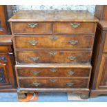 An 18th century crossbanded walnut chest on chest